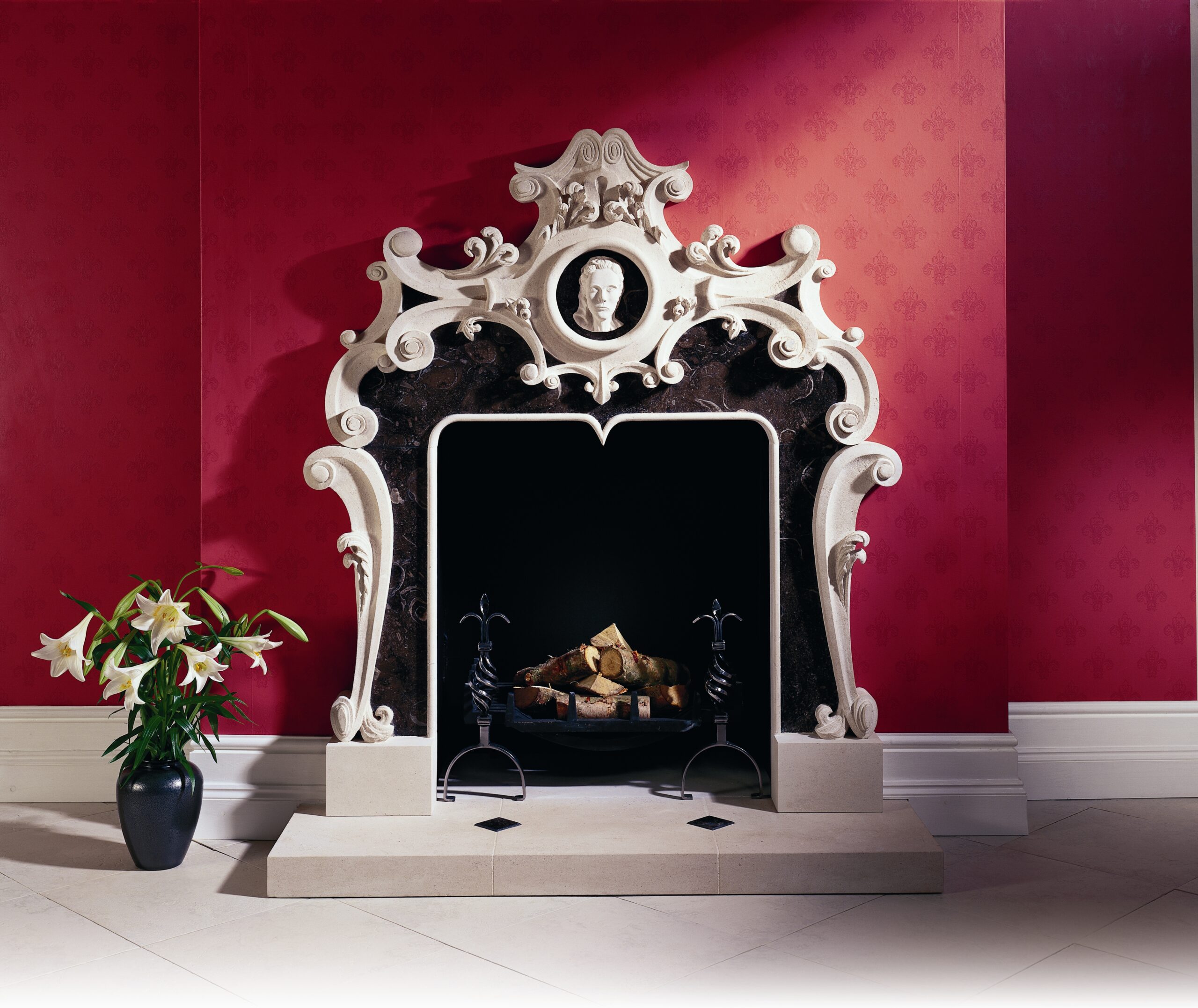 21. Portland Basebed with contrasting black fossilised limestone detail, carved in the Rococo style – Mayfair