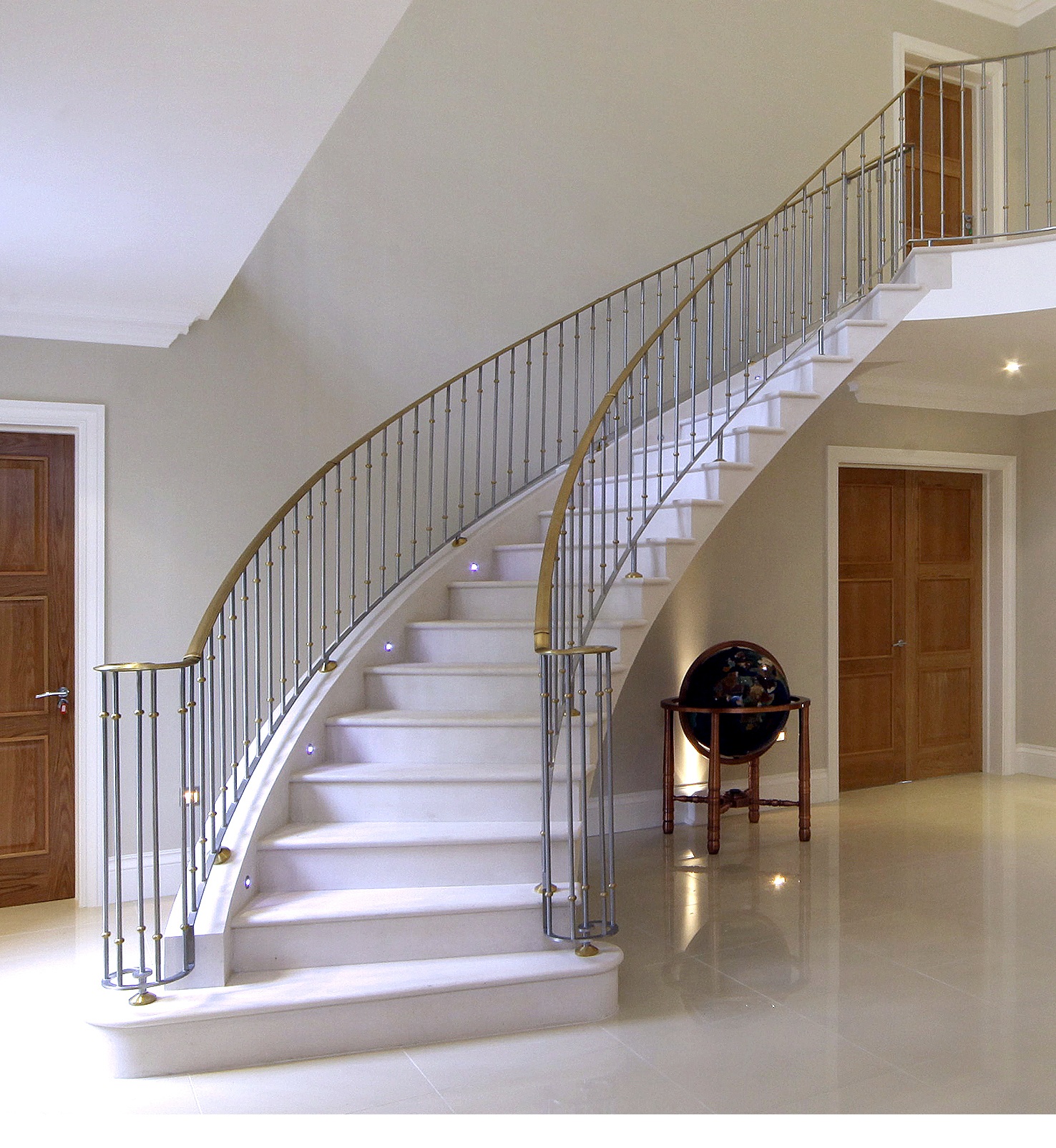12. Steel-supported honed Moleanos staircase with polished Moleanos stone flooring – Hertfordshire