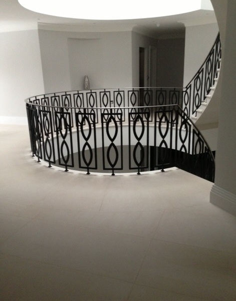 17. Two-storey Moleanos stone staircase with contemporary balustrade – Hertfordshire
