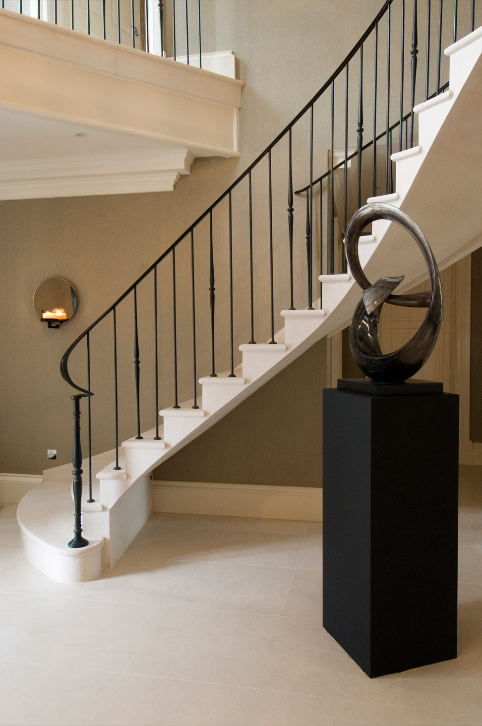 19. Moleanos stone cantilever stair with elegant metal balustrade and matching flooring – Surrey