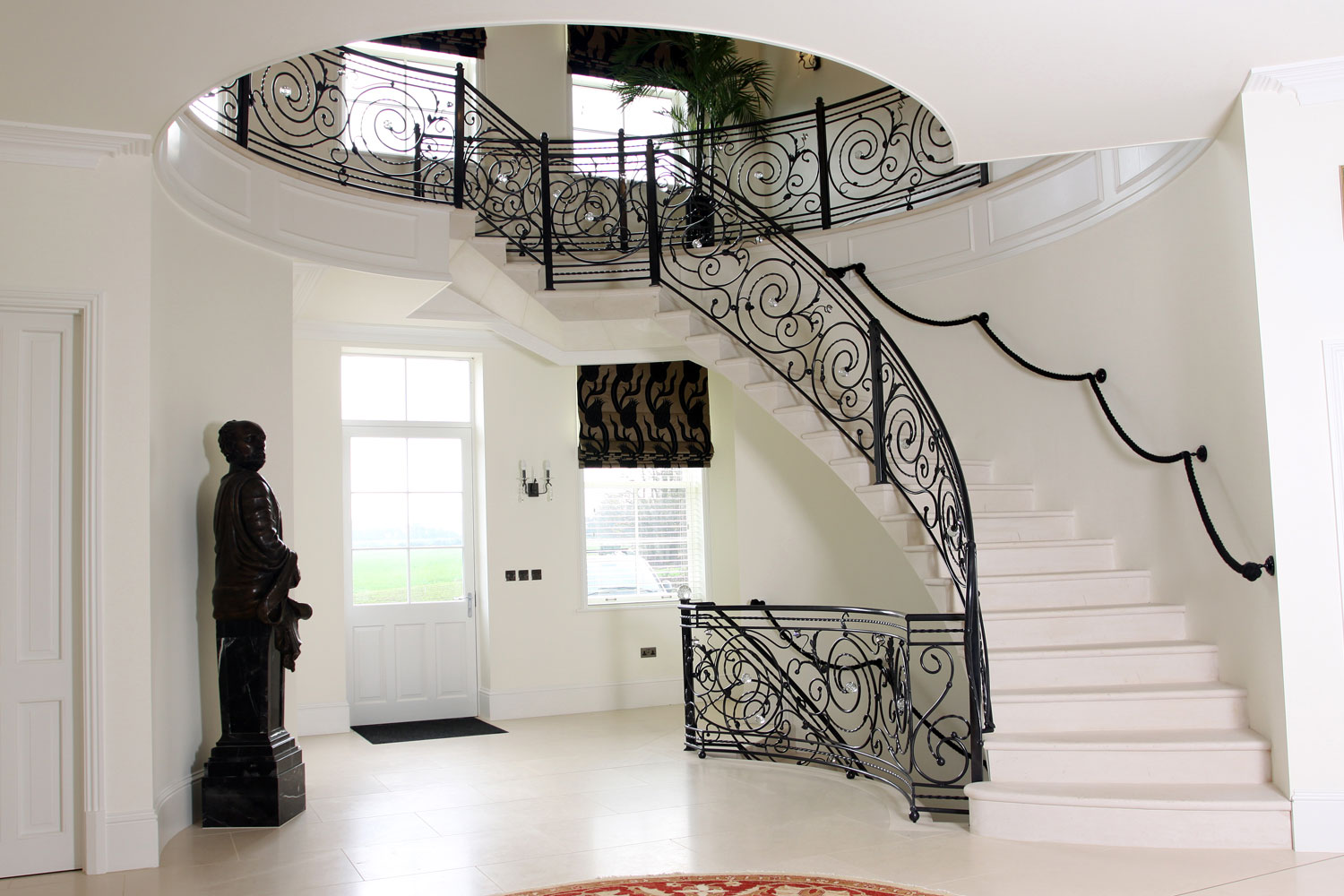 3. Moleanos stone cantilever staircase with solid stone in-flight landing – West Sussex