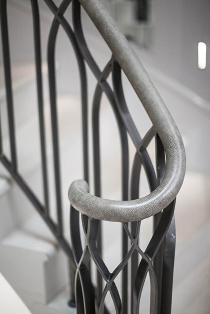 31. Malone stone stair with metal balustrade and leather wrapped handrail – Hertfordshire