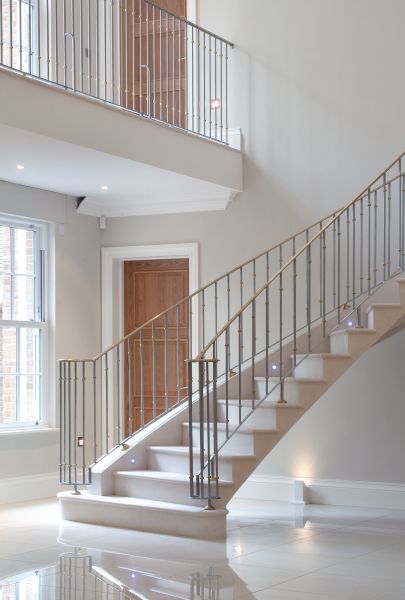 22. Steel supported moleanos stone cantilever stair with stainless steel balustrade and brass handrail – Hertfordshire