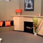 stone fireplace and stone staircase display - decorex