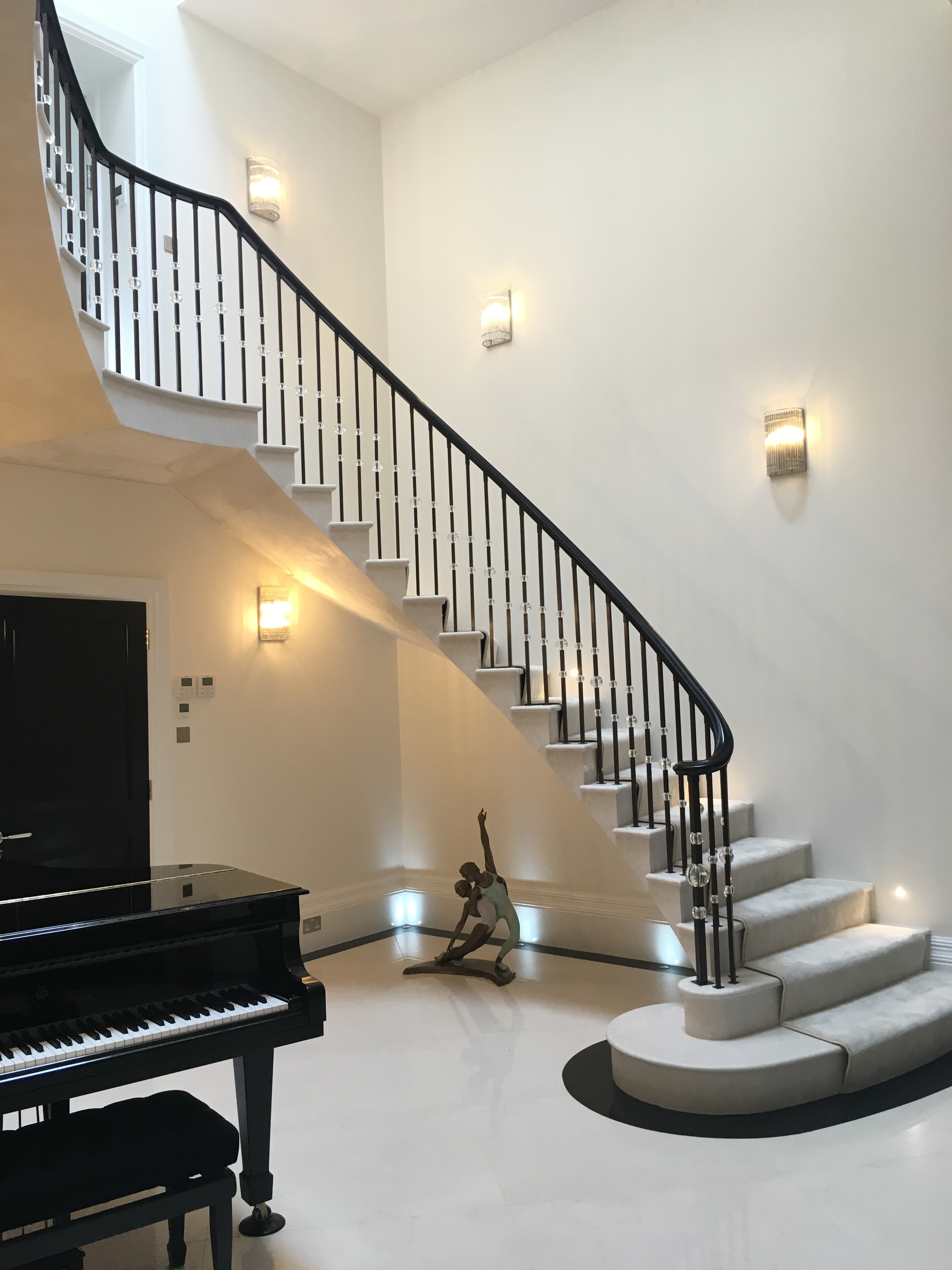 botticino cantilever staircase with an in flight landing