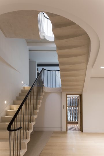 73. Moleanos Cantilever staircase with a bespoke shaped soffit